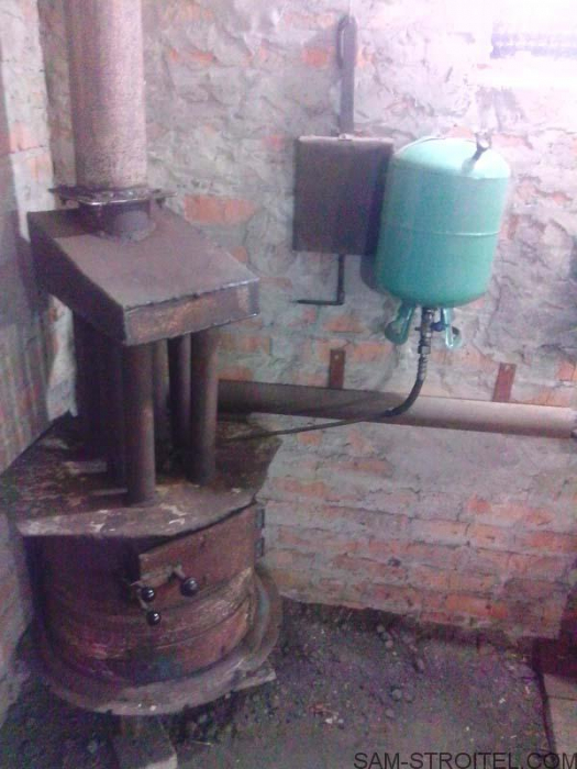 Печь из колёсных дисков на дровах и отработке